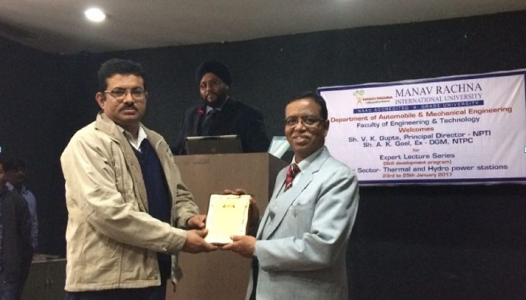 Dr. Devendra Vashist felicitating Mr. V.K.Gupta